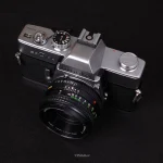 دوربین Minolta SRT 101b با لنز 50mm f/1.7