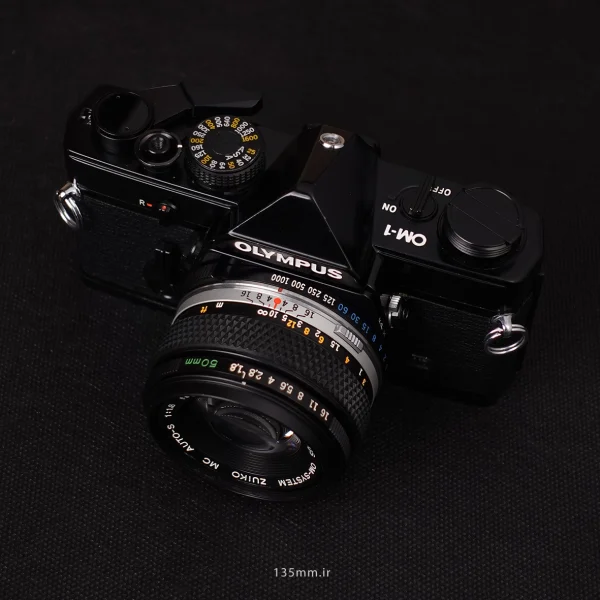 دوربین Olympus OM-1 با لنز 50mm f/1.8