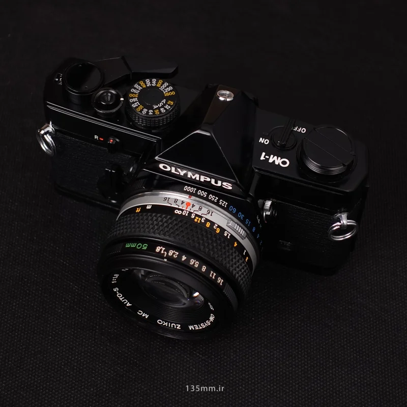 دوربین Olympus OM-1 با لنز 50mm f/1.8